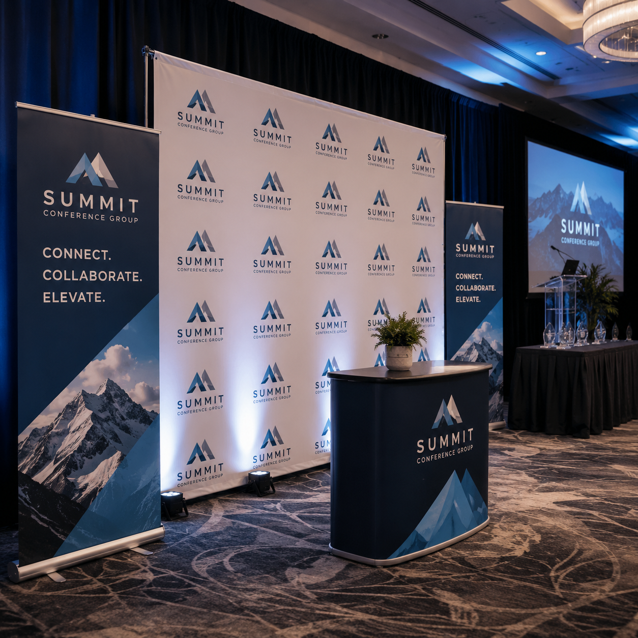 Summit Conference Group event setup with branded backdrop and table.